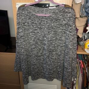 super cute sweater with detailing on the side